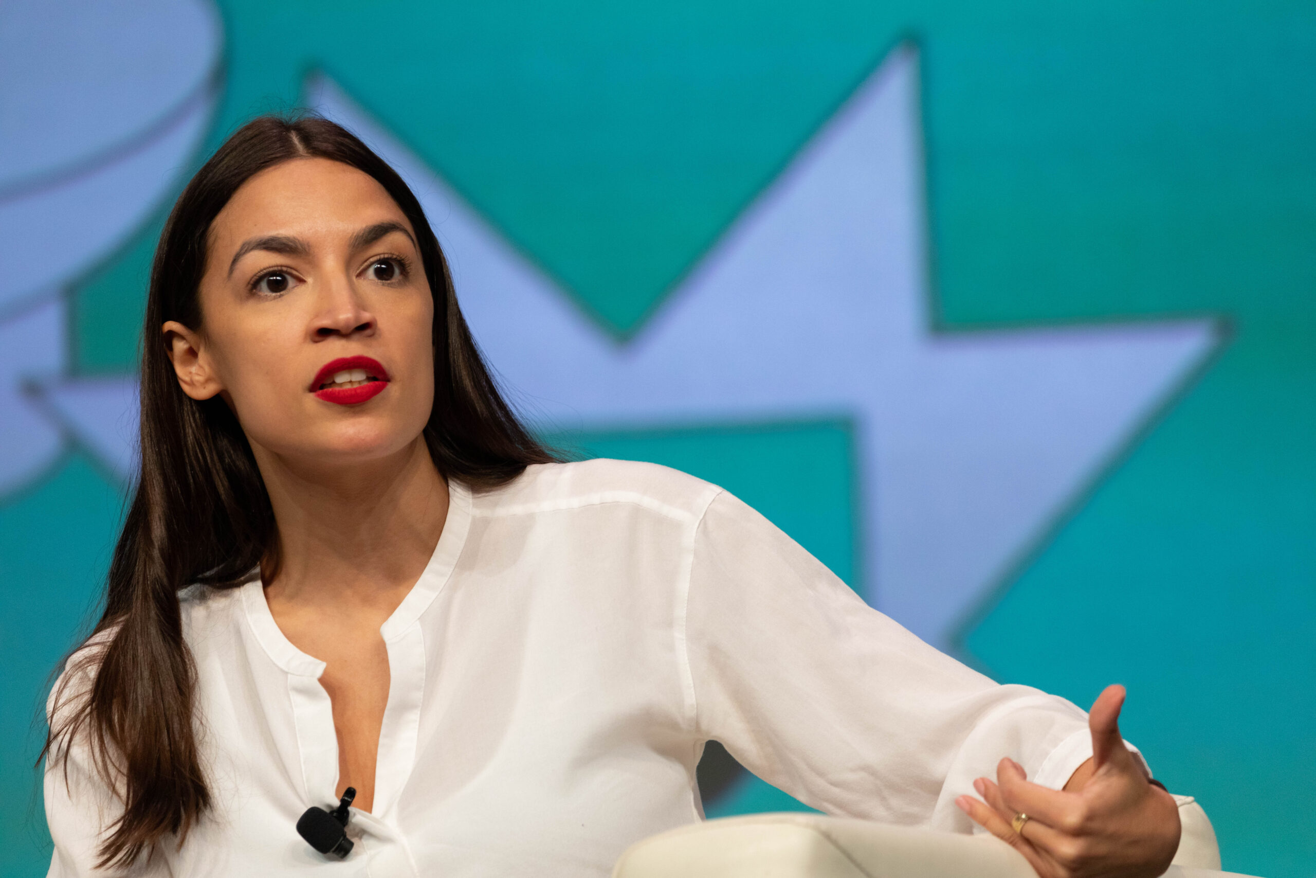 What do you say to AOC after her positive Covid test?
