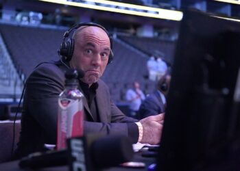 Is Spotify right to fact-check Joe Rogan for expressing his opinions on COVID?