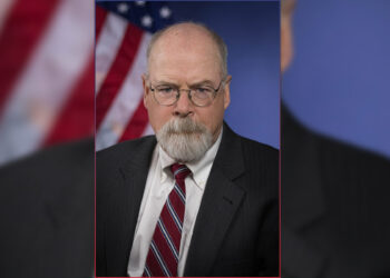 Should spying to overthrow the government be judged and punished as treason?